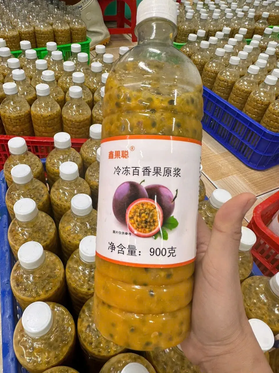 Passion fruit export batch ready — tractor pickup from farm, bottled and bagged pulp for retail and food-service buyers, 200L aseptic drums sealed, and reefer container loaded for shipment. — photo 2 of 5