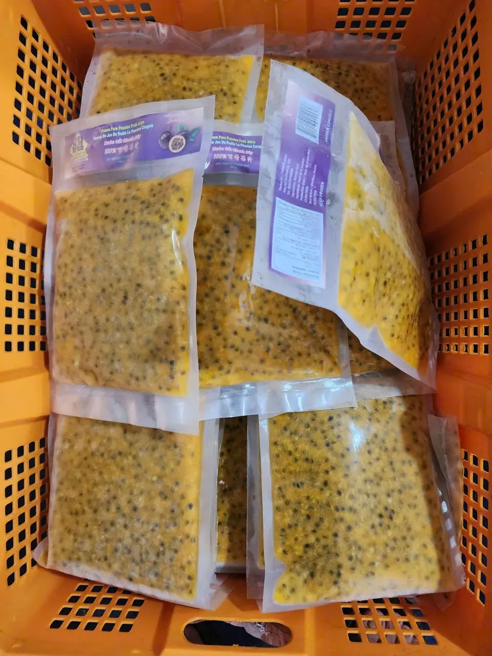 Frozen passion fruit pulp with seeds packed in export bags